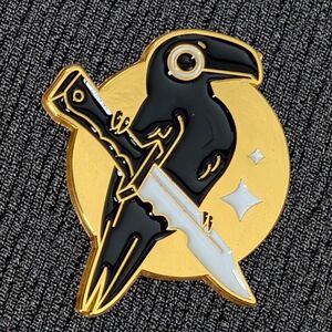 Black and Gold Raven Perched on a Dagger Enamel Pin